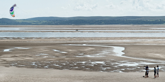 'Lets go fly a kite' on the sands at Burry Port.  For more information, go to - DiscoverCarmarthenshire.com